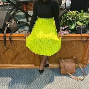 Neon polka dot pleated skirt